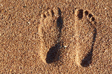 Footprint in the Sand. Sea beach, vacation idea