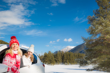 Poster - Happy family travel by car in winter