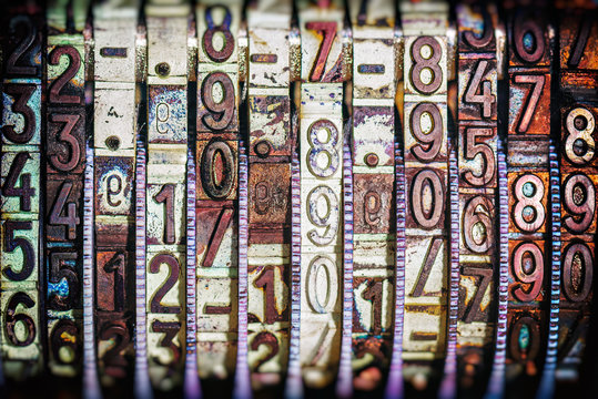 Numbers at a vintage stamper in closeup