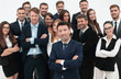 © ASDF - leader standing in front of a large business team
