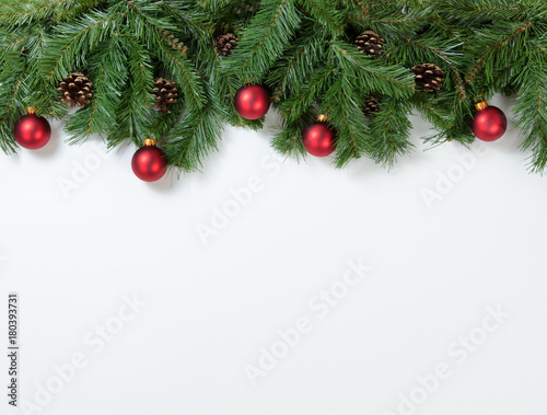 Christmas Red Ornaments Hanging In Fir Tree Branches Christmas Red Ornaments Hanging In Fir Tree Branches
