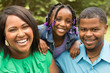 © digitalskillet1 - Happy African American Family.