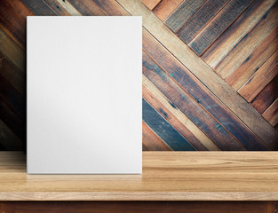 Leinwandbilder - Blank White paper poster on wooden table at diagonal wood plank wall,Template mock up for adding your design and leave space beside frame for adding more text..