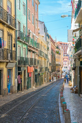Naklejka na meble Beautiful narrow old street in Lisbon.