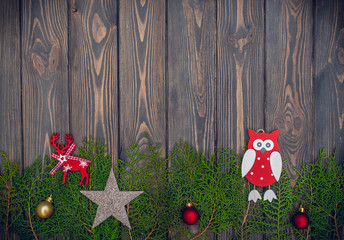 Wall Mural - Old-fashioned Christmas tree toys and old wood. Background for a New Year's greeting card