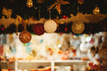 Wall Mural - Beautiful decorated Christmas tree background with bauble and xmas ornaments blurred in bokeh home