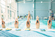 © Nomad_Soul - Kids doing exercise in swimming pool