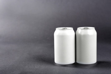 Tin cans on grey background