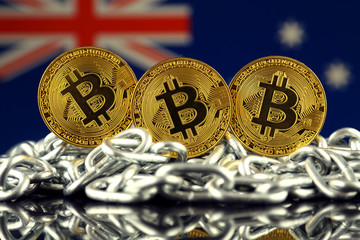 Wall Mural - Physical version of Bitcoin (new virtual money), chain and Australia Flag. Conceptual image for investors in cryptocurrency and Blockchain Technology in Australia.