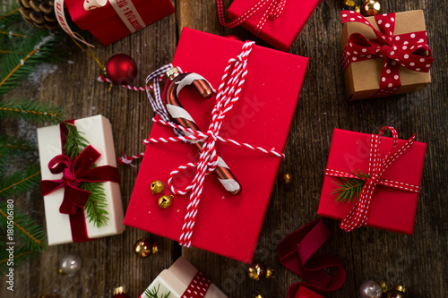 Download Christmas Gift Giving Pile Of Wrapped In Red And White Paper Christmas Gift Boxes On Wooden Background Top View Close Up Buy This Stock Photo And Explore Similar Images At 3D SVG Files Ideas | SVG, Paper Crafts, SVG File