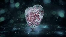 Romantic Grey Noir Ice Glass Heart With Snowflakes And White, Pink, Red Petals Inside Backdrop. For St. Valentine's Day, Birthday E-card, Christmas, New Year, Winter Holidays. Seamless Loop 4k
