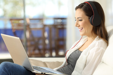 Sticker - Female watching media on line in a laptop