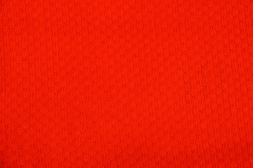 Poster - 
Texture of a bright red synthetic fabric, like a background.
