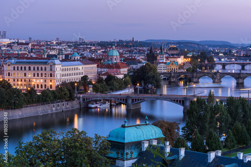 Poster The bridges of Prague át dawn
Dawn over the beautiful bridges and the embankment of the Vltava River flowing through the city center of Prague in the Czech Republic