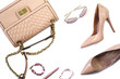 Women's set of fashion accessories in pink color on white background: shoes, handbag, sunglasses, lipsticks and jewelry