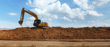 Panorama Of Excavator With Blue Sky