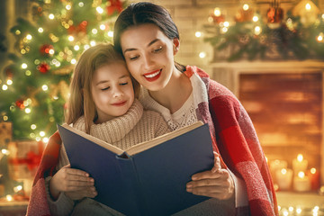 Wall Mural - mother reading a book