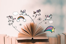 A Fairy Tales Open Book With Unicorn And Rainbow Illustration Doodles- Imagination Concept