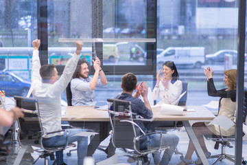 Wall Mural - startup Group of young business people celebrating success