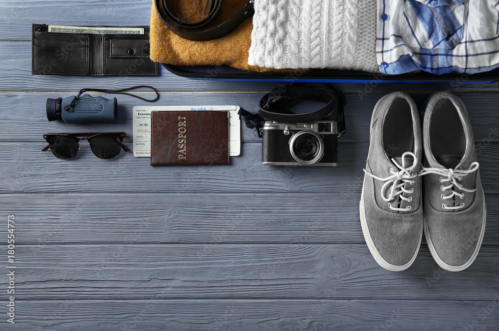 Tourist stuff on wooden background