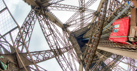 Fototapete - Powerful structure of Eiffel Tower, wide angle view
