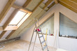 © artursfoto - Attic renovation and thermal Insulation with mineral rock wool