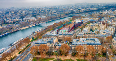Fototapete - Paris aerial skyline with Seine river on a cloudy winter day, Fr