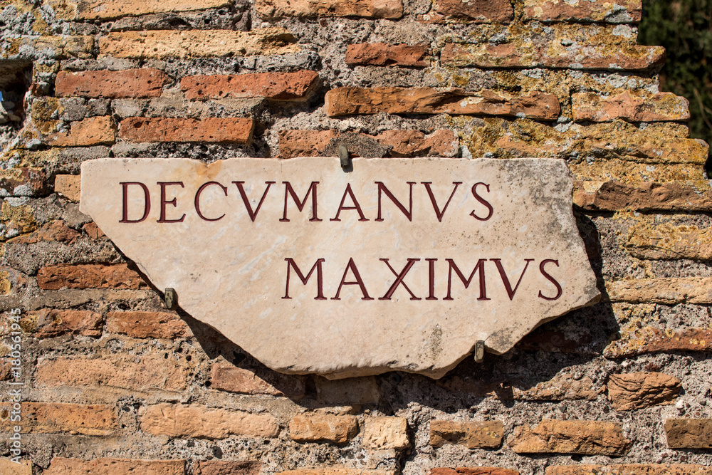 Sign On The Perimetral Wall In Ancient Roman City Ostia Antica Stock sign-on-the-perimetral-wall-in-ancient-roman-city-ostia-antica-stock