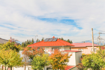  Solar panels on the roof ,Photovoltaic modules for innovation green energy for life with blue sky background .