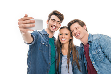 young friends taking selfie