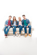 © LIGHTFIELD STUDIOS - young friends sitting on sofa