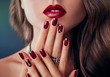 © maryviolet - Beautiful woman with red lips and manicure