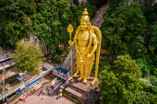 Batu Caves near Kuala Lumpur, Malaysia, aerial view of Lord Murugan Statue and entrance to the famous cave temples Poster
