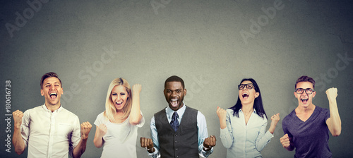 Fotografía Successful people men and women are celebrating a victory