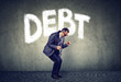 © pathdoc - Stressed business man under debt pressure