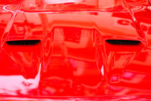 Close-up Of Hood Of Red Vintage Car