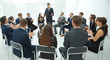 © ASDF - coach leads the session with the business team.