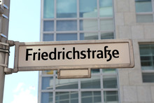 Main Street Of Berlin In The Road Sign Called Friedrichstrasse T