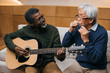 © LIGHTFIELD STUDIOS - senior friends playing music