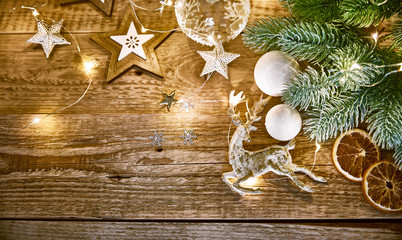 Wall Mural - Christmas card with branch fir snow and glass ball on old wooden