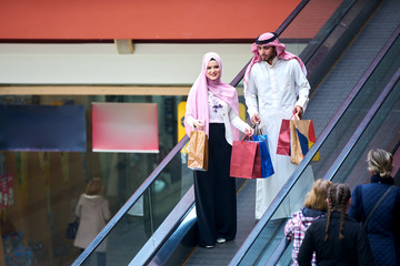 Wall Mural - Young muslim couple shopping