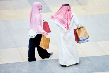 Wall Mural - Young muslim couple shopping