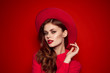 © SHOTPRIME STUDIO - beautiful woman with hat, brown hair, hand at face