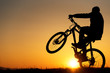 silhouette of biker