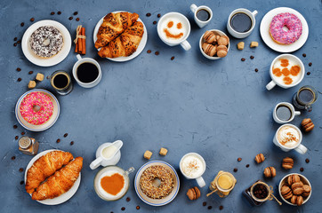 Wall Mural - Stone background with different types of coffee and desserts to them