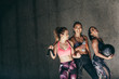 © Jacob Lund - Group of female friends relaxing after workout