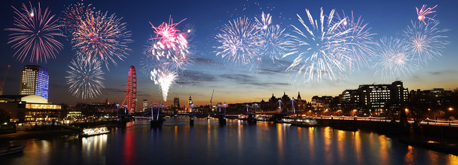 London skyline, night view, fireworks over Hungerford Bridge and Big Ben