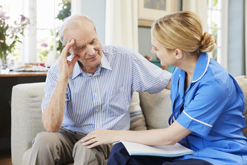 Wall Mural - Community Nurse Visits Senior Man Suffering With Depression