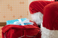 Santa Claus With Sack Of Gifts Boxs On Merry Christmas Concept