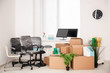 © Africa Studio - Moving boxes and different stuff in new office
